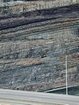 Pound Gap where the uppermost portion of the Mississippian Grainger Formation is here composed of alternating relatively continuous to occasionally shallowly channeled beds of sand with uniform sharp bedding planes and shale; both lithologies vary in thickness and the sands often exhibit Bouma sequences suggesting deposition from turbidite currents that were active over a mid to outer fan setting