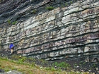 Pound Gap at the contact between the thin bedded Mississippian Grainger Formation, here composed of alternating thin sands and shale, and the overlying Lower Mississippian Newman Limestone Formation