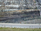 Pound Gap and a view of the contact between the interbedded sands and shales of the Mississippian Grainger and the overlying Lower Mississippian Newman Limestone Formation. Note the chocolate colored dolomite horizon just above the contact