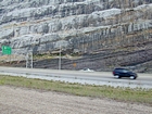 Pound Gap at the contact between the interbedded sands and shales of the Mississippian Grainger and the overlying Lower Mississippian Newman Limestone Formation. Note the chocolate colored dolomite horizon just above the contact. This is composed of relatively continuous beds of shallow water carbonate that locally develop mounds and are channeled. Beds have irregular but sharp bedding planes and some shale partings and dolomitized siltstones