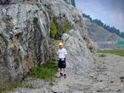 Thin irregular beds of shallow water limestone from the Lower Mississippian Newman Limestone Formation, interpreted here to be the product of deposition at the shore face overlying carbonate bodies that once moved across this setting. Marc Russell as scale. From ground up, there is 16 ½ feet of unit 108 in front of Marc Russell, see the measured Geological Section, Kentucky Geological Survey Field Trip Guide, 1998