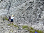 Shallow water oolitic and bioclastic grainstone carbonates of the Lower Mississippian Newman Limestone Formation. Note the 98 paint mark denoting that unit of the Kentucky Geological Survey measured section from their 1998 Field Trip