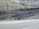 Pound Gap at the exposure of the contact between the interbedded sands and shales of the Mississippian Grainger and the overlying Lower Mississippian Newman Limestone Formation. Note the chocolate colored dolomite horizon just above the contact. The limestone here is composed of relatively continuous beds of shallow water carbonate that locally develop mounds and are channeled. Beds have irregular but sharp bedding planes with some shale partings and dolomitized siltstones