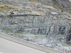 Close to the top of the Lower Mississippian Newman Limestone Formation where the limestones exhibit a locally irregular character, probably the result of storm reworking, while local currents account for the development of low angle cross beds and mound margin clinoforms suggesting migrating carbonate bodies moving across this setting. Note the exposure of the Upper Newman Limestone in the upper right-hand corner of the photograph. Unit 94extends from base to green layer, see the measured Geological Section, Kentucky Geological Survey Field Trip Guide 1998