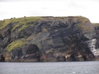 Exposures of Upper Clare Shale in the cliffs just south west of Bromore West in Co Kerry. These Upper Carboniferous (Namurian) outcrops are north of Ballybunion but best seen from the Shannon Estuary. The shales represent a change in depositional setting from the underlying Dinantian shallow shelf carbonates to the influx of siliciclastics that upward change to turbidites to deltaic sediments (Lewarne, 1959; Brennand, 1965; Rider, 1969, and Martinsen, 1989).