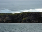 Exposures of Upper Clare Shale in the cliffs just south west of Bromore West in Co Kerry. These Upper Carboniferous (Namurian) outcrops are north of Ballybunion but best seen from the Shannon Estuary. The shales represent a change in depositional setting from the underlying Dinantian shallow shelf carbonates to the influx of siliciclastics that upward change to turbidites to deltaic sediments (Lewarne, 1959; Brennand, 1965; Rider, 1969, and Martinsen, 1989).