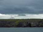 Exposures of Upper Clare Shale overlain by Ross Formation in the cliffs west of Bromore West and Drom in Co Kerry. These Namurian outcrops are south of Kilconly best seen from the Shannon Estuary. The shales evolve upward in depositional setting from a deeper euxinic setting with an influx of shales that upward change to turbiditic sands (Rider, 1969, and Martinsen, 1989).