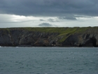 Exposures of Upper Clare Shale overlain by Ross Formation in the cliffs west of Bromore West and Drom in Co Kerry. These Namurian outcrops are south of Kilconly best seen from the Shannon Estuary. The shales evolve upward in depositional setting from a deeper euxinic setting with an influx of shales that upward change to turbiditic sands (Rider, 1969, and Martinsen, 1989).