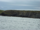 Exposures of Ross Formation in the cliffs west and south of Drom in Co Kerry (Pyles, 2007). These Namurian outcrops of turbiditic sands can be accessed by road, across the cow pastures at Drom and then scrambling down a small steep path besides cliffs.