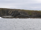 Exposures of Ross Formation in the cliffs west and south of Drom in Co Kerry. These Namurian outcrops turbiditic sands extend south east from the ruined Castle at Leck Point and are best seen from the Shannon Estuary (Rider, 1969, Martinsen, 1989; and Pyles, 2007).