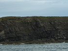 Exposures of Ross Formation in the cliffs west and south of Drom in Co Kerry. These Namurian outcrops turbiditic sands extend south east from the ruined Castle at Leck Point and are best seen from the Shannon Estuary (Rider, 1969, Martinsen, 1989; and Pyles, 2007).