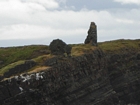 Exposures of Ross Formation in the cliffs at Leck Point in vicinity of the ruins of the Castle west and south of Drom in Co Kerry (Pyles, 2007). These Namurian outcrops turbiditic sands can be accessed by road and across the cow pastures at Drom.