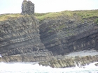 Exposures of Ross Formation in the cliffs at Leck Point in vicinity of the ruins of the Castle west and south of Drom in Co Kerry (Pyles, 2007). These Namurian outcrops turbiditic sands can be accessed by road and across the cow pastures at Drom.