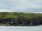 Exposures of Ross Formation in the cliffs northwest of Drom in Co Kerry. These Namurian outcrops turbiditic sands extend northwest from the ruined Castle at Leck Point and are best seen from the Shannon Estuary (Rider, 1969, Martinsen, 1989; and Pyles, 2007).