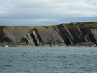 Exposures of Ross Formation in the cliffs northwest of Drom in Co Kerry. These Namurian outcrops turbiditic sands extend northwest from the ruined Castle at Leck Point and are best seen from the Shannon Estuary (Rider, 1969, Martinsen, 1989; and Pyles, 2007).