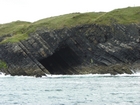 Exposures of Ross Formation in the cliffs northwest of Drom in Co Kerry. These Namurian outcrops turbiditic sands extend northwest from the ruined Castle at Leck Point and are best seen from the Shannon Estuary (Rider, 1969, Martinsen, 1989; and Pyles, 2007).