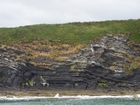 Exposures of Ross Formation in the cliffs northwest of Drom in Co Kerry. These Namurian outcrops turbiditic sands extend northwest from the ruined Castle at Leck Point and are best seen from the Shannon Estuary (Rider, 1969, Martinsen, 1989; and Pyles, 2007).