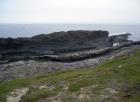 Ledge exposing the slumped Ross Slide of Gill (1954) and also described as a series of sedimentary slumped features by Strachen (2002).