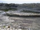 Ledge exposing the slumped Ross Slide of Gill (1954) and also described as a series of sedimentary slumped features by Strachen (2002).