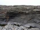 Ledge exposing the slumped Ross Slide of Gill (1954) and also described as a series of sedimentary slumped features by Strachen (2002).