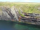 Moniclinically folded deepwater sediment of the Upper Carboniferous Namurian Ross Sandstone just south of Fisherman's Point.