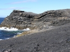 Exposed in the flank of a monocline are the Fisherman's Point Namurian deepwater sediments. Note the cut and fill of channeled Ross Formation. Channel fill overtops the channeling forming winged onlapping overbank sands.