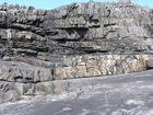 Fisherman's Point exposing Namurian deepwater sediments. Note the cut and fill of channeled Ross Formation on the flank of the coastal monocline.