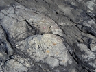 Just south of Fisherman's Point the deepwater sediments of Ross Formation are exposed submarine sand volcanos.