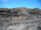 Fisherman's Point exposing Namurian deepwater sediments. Note the cut and fill of channeled Ross Formation on the flank of the coastal monocline.