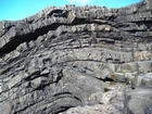 Fisherman's Point exposing Namurian deepwater sediments. Note the cut and fill of channeled Ross Formation on the flank of the coastal monocline.