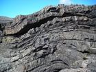 Fisherman's Point exposing Namurian deepwater sediments. Note the cut and fill of channeled Ross Formation on the flank of the coastal monocline.