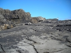 Namurian deepwater sediments exposed in eastern flank of monocline at Fisherman's Point exhibiting cut and fill of channeled Ross Formation.