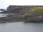 Gull Island Formation with large deformational structures interpreted to have been transported downslope from a deltaic source above.