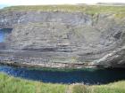 Gull Island Formation with large deformational structures interpreted to have been transported downslope from a deltaic source above. Base of section are amalgamated channel sands overlain by mix of mud, shale, silts and sand. Some are chanelled and some slumper and show softe sediment deformation.