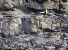 Sediment loading and scouring at the base of Channeled Sand Lobes in the Ross Formation on the West side of Kilbaha Bay