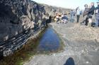 Amalgamated deepwater channeled sands of the Ross Formation, At base of the ledge is a chute scour surface beneath the deepwater channel fill. The megachute is inturn filled by interbedded shales and sands.