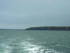 Western portionof the Kilclogher Cliffs exposing deepwater sandstone lobes of the Ross Formation. At the base of the section is a thicker amalgamated of a chnannel axies and above this are thinner bedded more distal portions of lobes. Above are thicker bedded amalgamated channeled sands more proximal to the axies of deepwater lobes. The extreme western upper portion is characterized by more obviously channelled sands.