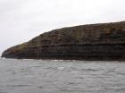 Kilclogher Cliffs exposing deepwater sandstone lobes of the Ross Formation. In the section below are thinner bedded more distal portions of lobes while above are thicker bedded sands towards axies of the lobes.