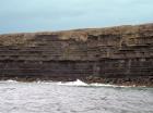 Kilclogher Cliffs exposing deepwater sandstone lobes of the Ross Formation. In the section below are thinner bedded more distal portions of lobes while above are thicker bedded sands towards axies of the lobes.