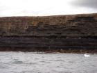 Kilclogher Cliffs exposing deepwater sandstone lobes of the Ross Formation. In the section below are thinner bedded more distal portions of lobes while above are thicker bedded sands towards axies of the lobes.