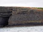 Kilclogher Cliffs exposing deepwater sandstone lobes of the Ross Formation. In the section below are thinner bedded more distal portions of lobes while above are thicker bedded sands towards axies of the lobes.