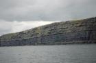 Kilclogher Cliffs exposing deepwater sandstone lobes of the Ross Formation. In the section below are thinner bedded more distal portions of lobes while above are thicker bedded sands towards axies of the lobes.