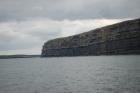 Kilclogher Cliffs exposing deepwater sandstone lobes of the Ross Formation. In the section below are thinner bedded more distal portions of lobes while above are thicker bedded sands towards axies of the lobes.