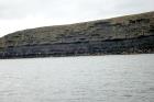 Kilclogher Cliffs exposing deepwater sandstone lobes of the Ross Formation. In the section below are thinner bedded more distal portions of lobes while above are thicker bedded sands towards axies of the lobes.