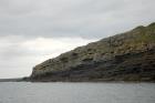 Kilclogher Cliffs exposing deepwater sandstone lobes of the Ross Formation. In the section below are thinner bedded more distal portions of lobes while above are thicker bedded sands towards axies of the lobes. Note the generation of some amalgamated axial channel fill that would be expected close to the middle of lobe.