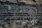 Kilclogher Cliffs exposing deepwater sandstone lobes of the Ross Formation. At the base of the section are thinner bedded more distal portions of lobes capped by thicker bedded sands towards axies of the lobes.