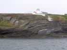 Kilcredaun Cliffs in the vicinity of the Kilcredaun lighthouse. Outcropping in these cliffs are thin bedded turbidite channel fill and turbidite sand lobes in the Upper Carboniferous Namurian Ross Formation. Photographs taken from the fishing vessel Draiocht out of Carrigaholt on the northern shore of the Shannon Estuary.