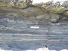 Kilcredaun Cliffs in the vicinity of the Kilcredaun lighthouse. On land and close up images of flazer structures and small slumps in thin bedded turbidite overbank and channel fill in the Upper Carboniferous Namurian Ross Formation. Photographs taken by Chistopher kendall and Peter Haughton on the wave cut ledges of northern shore of the Shannon Estuary.