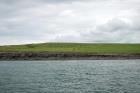 Kilcredaun Cliffs exposing thin bedded turbidite channel fill and turbidite sand lobes in the Upper Carboniferous Namurian Ross Formation. Photographs taken from the fishing vessel Draiocht out of Carrigaholt on the northern shore of the Shannon Estuary.