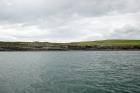 Kilcredaun Cliffs exposing thin bedded turbidite channel fill and turbidite sand lobes in the Upper Carboniferous Namurian Ross Formation. Photographs taken from the fishing vessel Draiocht out of Carrigaholt on the northern shore of the Shannon Estuary.